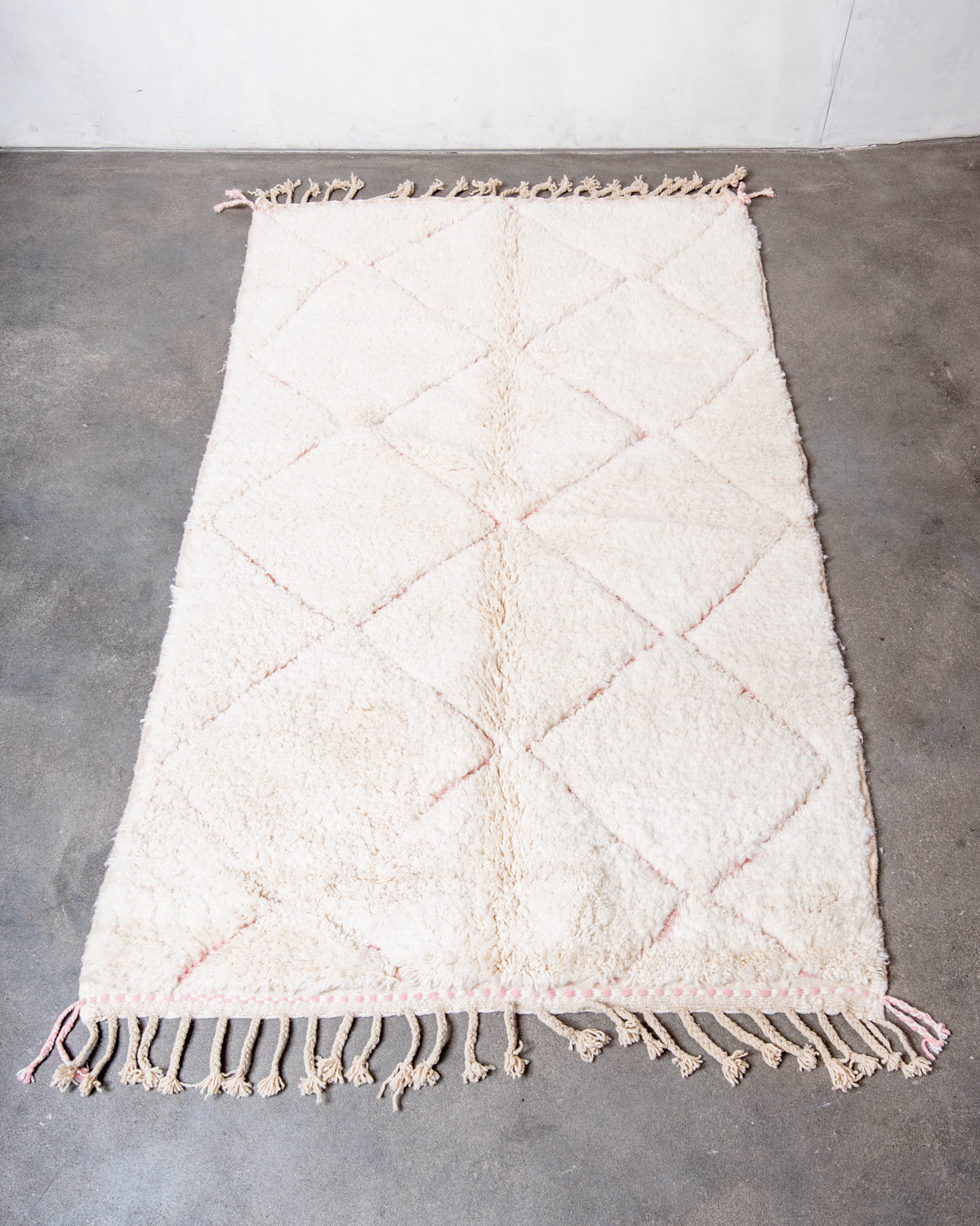 Modern, designer, handcrafted Berber rug from Morocco. Beniourain carpet with beautiful colours and patterns and fluffy wool texture.